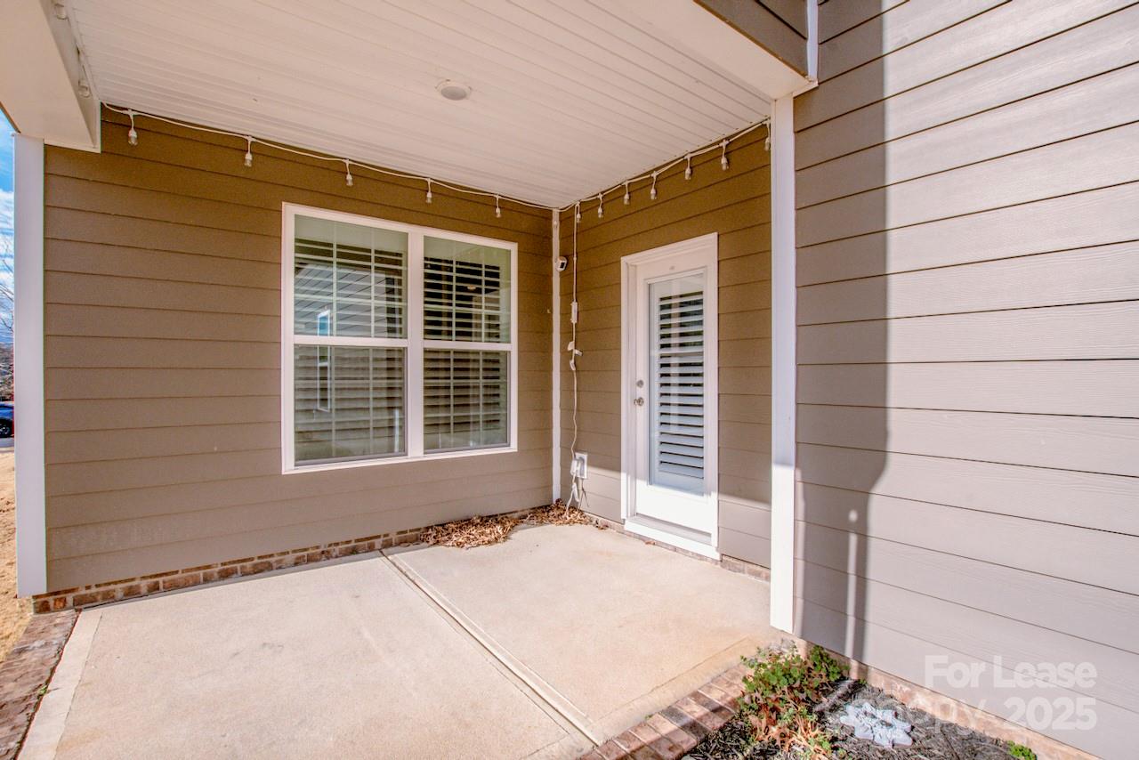 13218 Caite Ridge Road Davidson, NC 28036 - Photo 36 of 48 a front view of a house with a garage