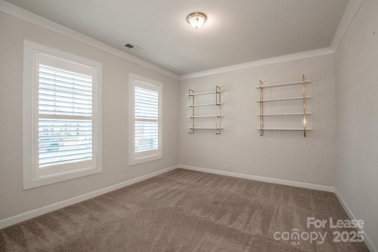 13218 Caite Ridge Road Davidson, NC 28036 - Photo 37 of 48 an empty room with windows