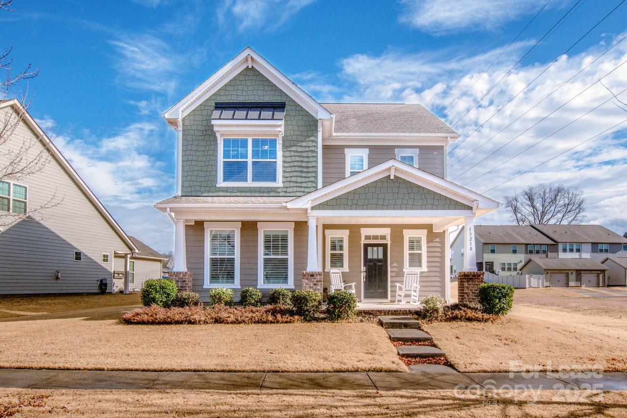 13218 Caite Ridge Road Davidson, NC 28036 - Photo 6 of 48 a front view of a house with yard