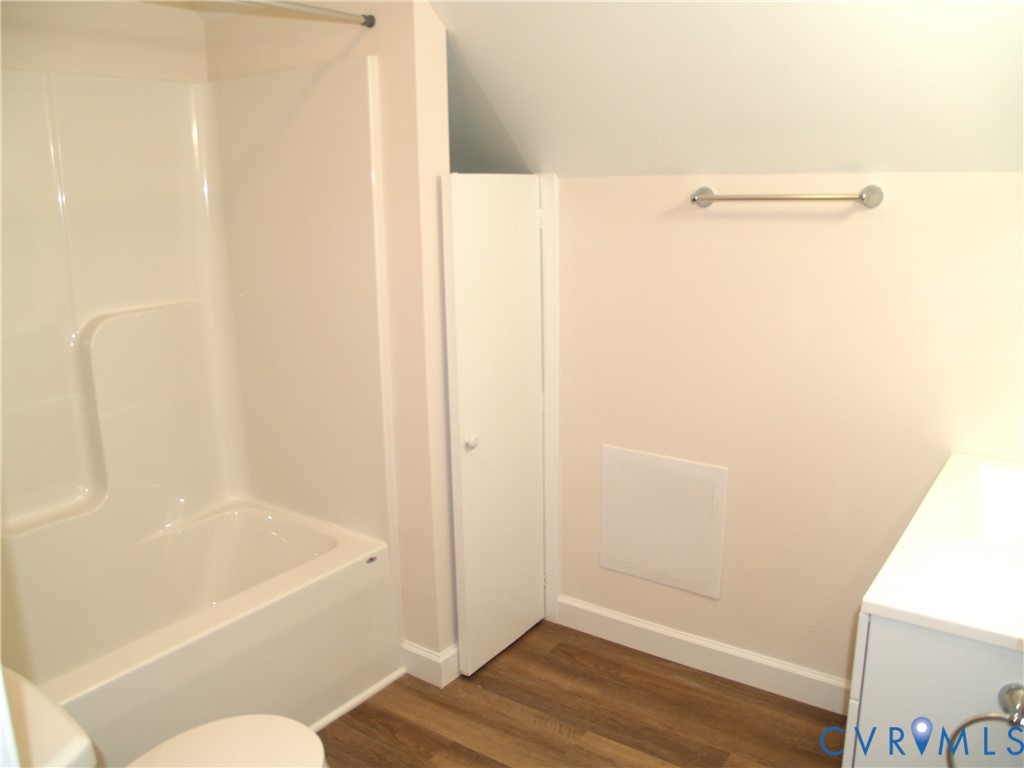 3129 Chickahominy Road Toano, VA 23168 - Photo 22 of 39 a bathroom with a bathtub and a shower
