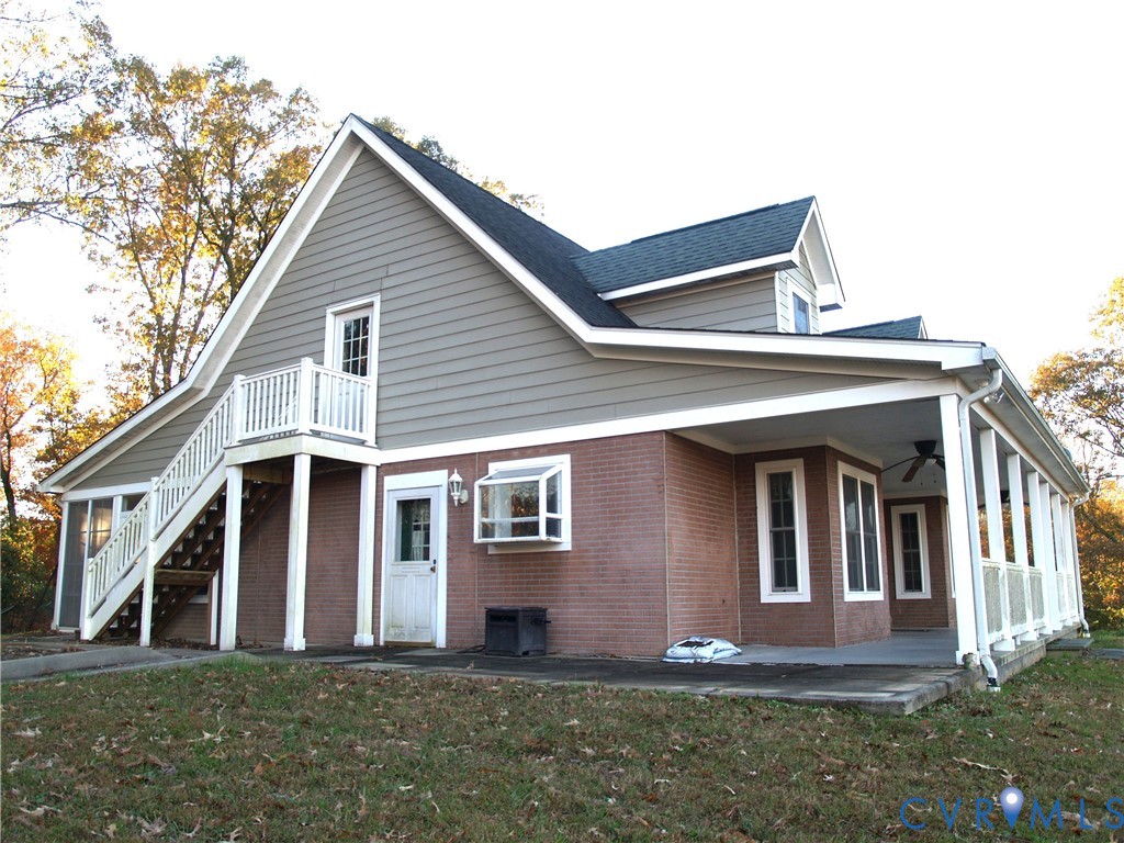 3129 Chickahominy Road Toano, VA 23168 - Photo 27 of 39 a front view of a house with a yard
