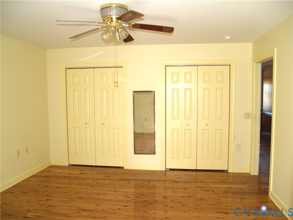 3129 Chickahominy Road Toano, VA 23168 - Photo 10 of 39 a view of an empty room with closet and a window