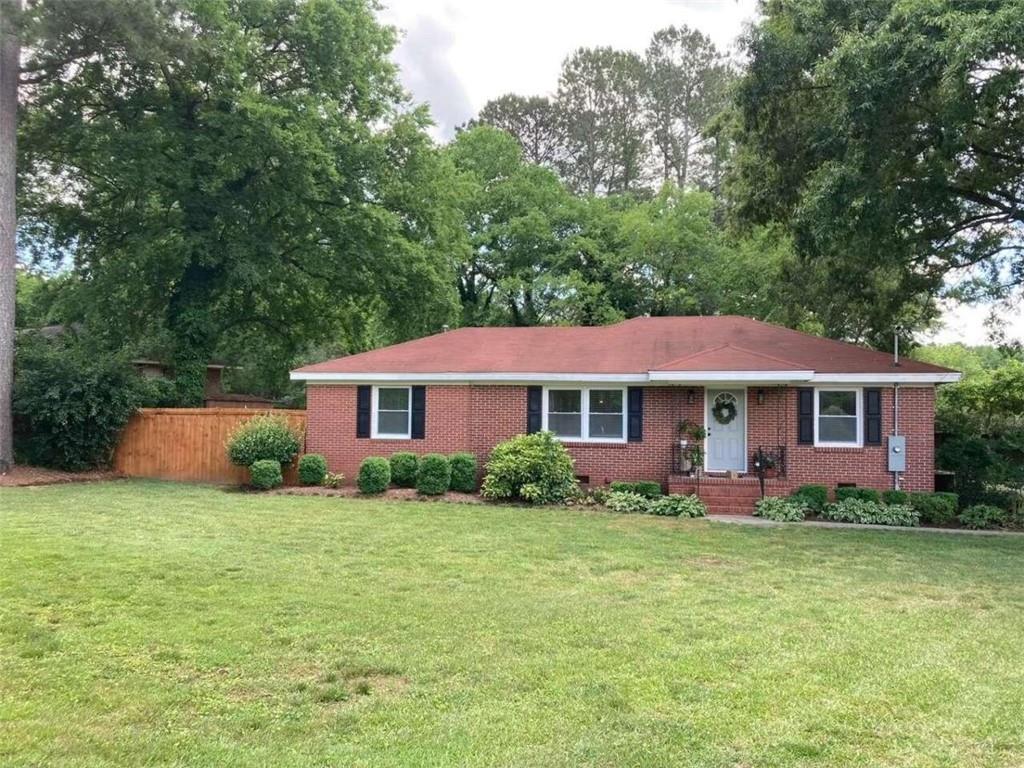 108 East Valley Road Northeast Rome, GA 30161 - Photo 1 of 1 a view of a house with a yard