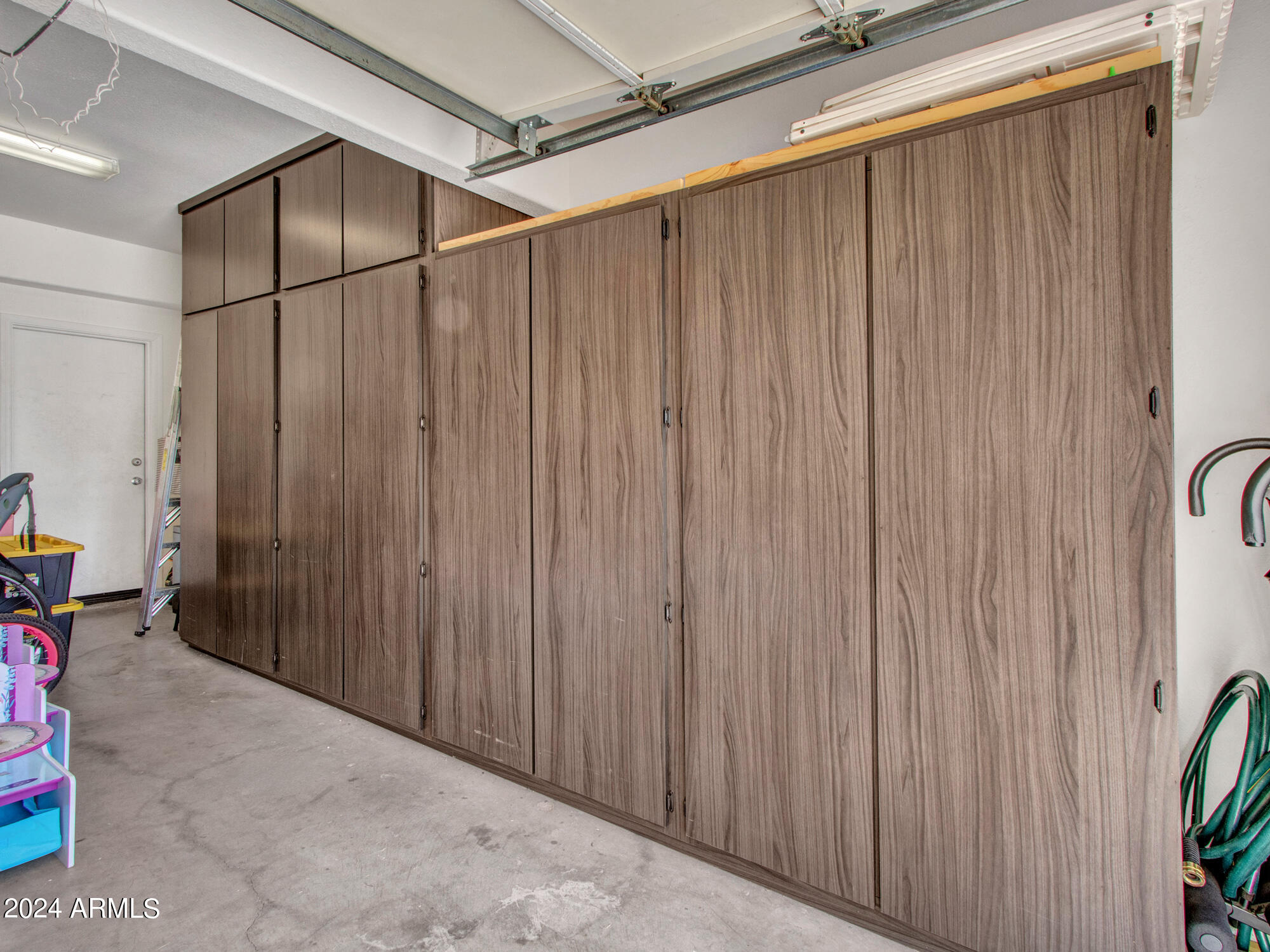 2801 North Litchfield Road, Unit 60 Goodyear, AZ 85395 - Photo 6 of 37 02-Garage storage