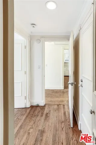 a bathroom with a granite countertop shower and a toilet