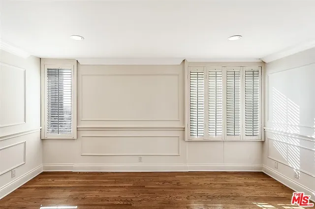 a view of a room with a large window