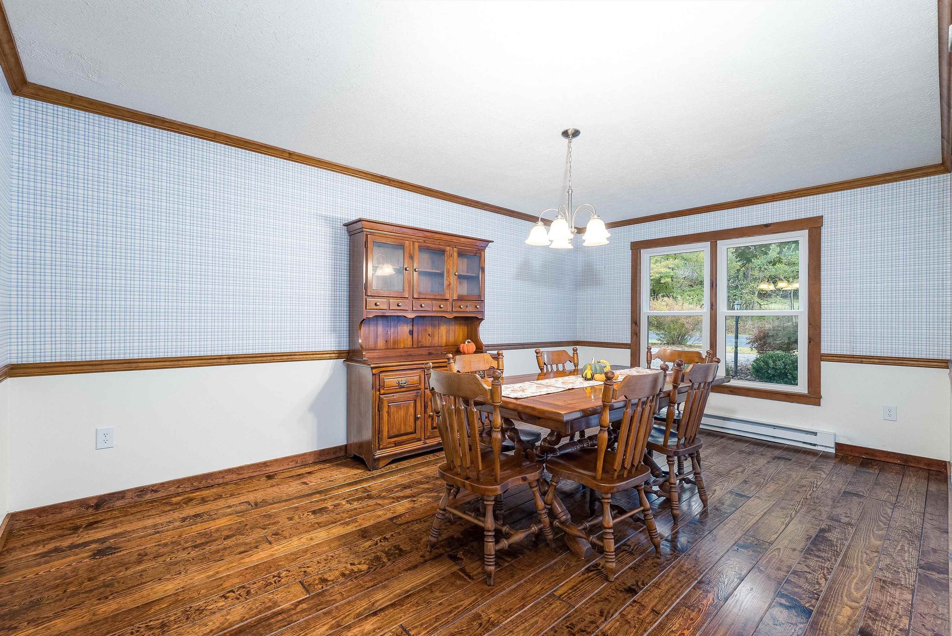598 Broadhead School Road Greenville, VA 24440 - Photo 15 of 55 a view of a dining room with furniture window and wooden floor