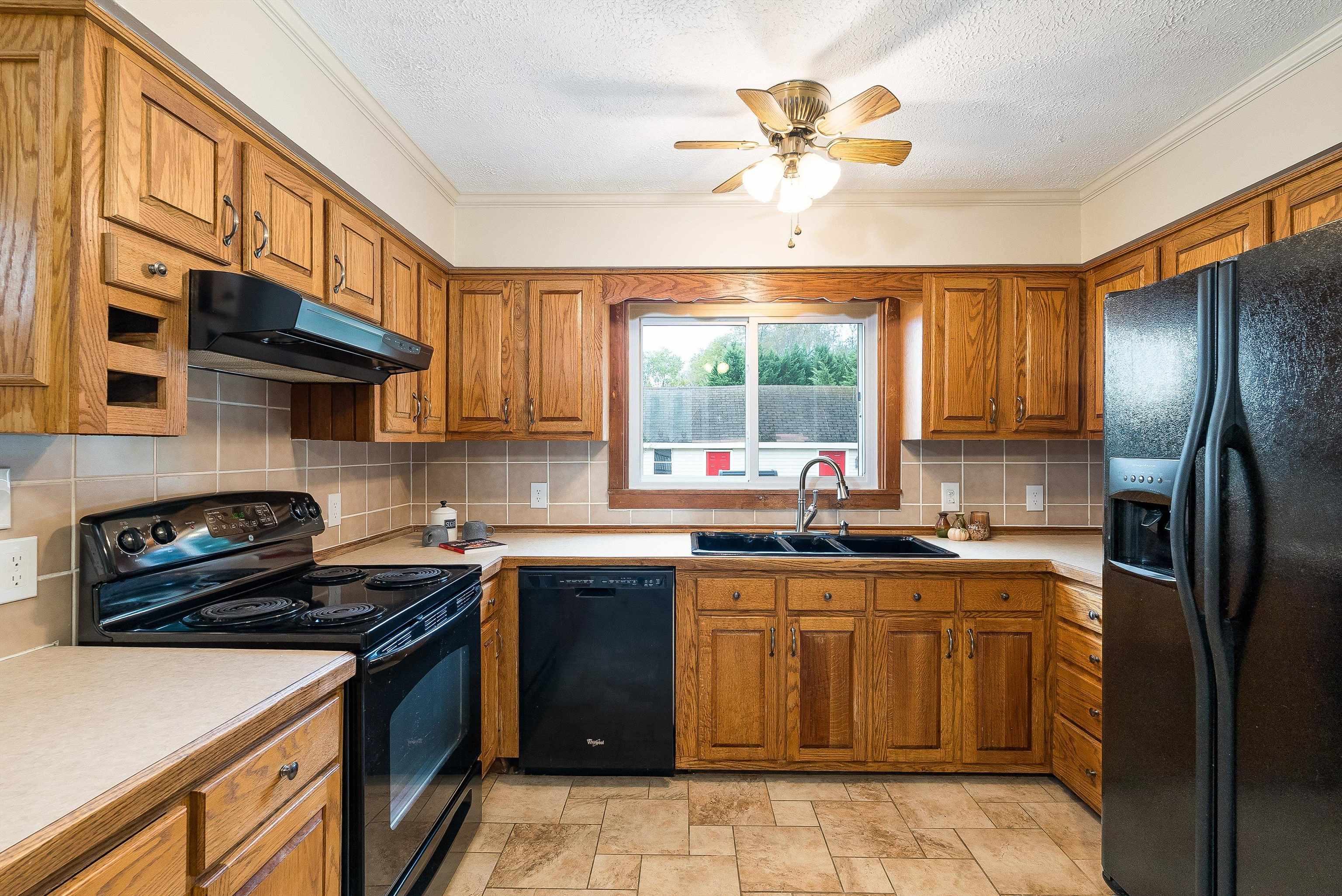 598 Broadhead School Road Greenville, VA 24440 - Photo 23 of 55 a kitchen with stainless steel appliances granite countertop a stove sink refrigerator and cabinets