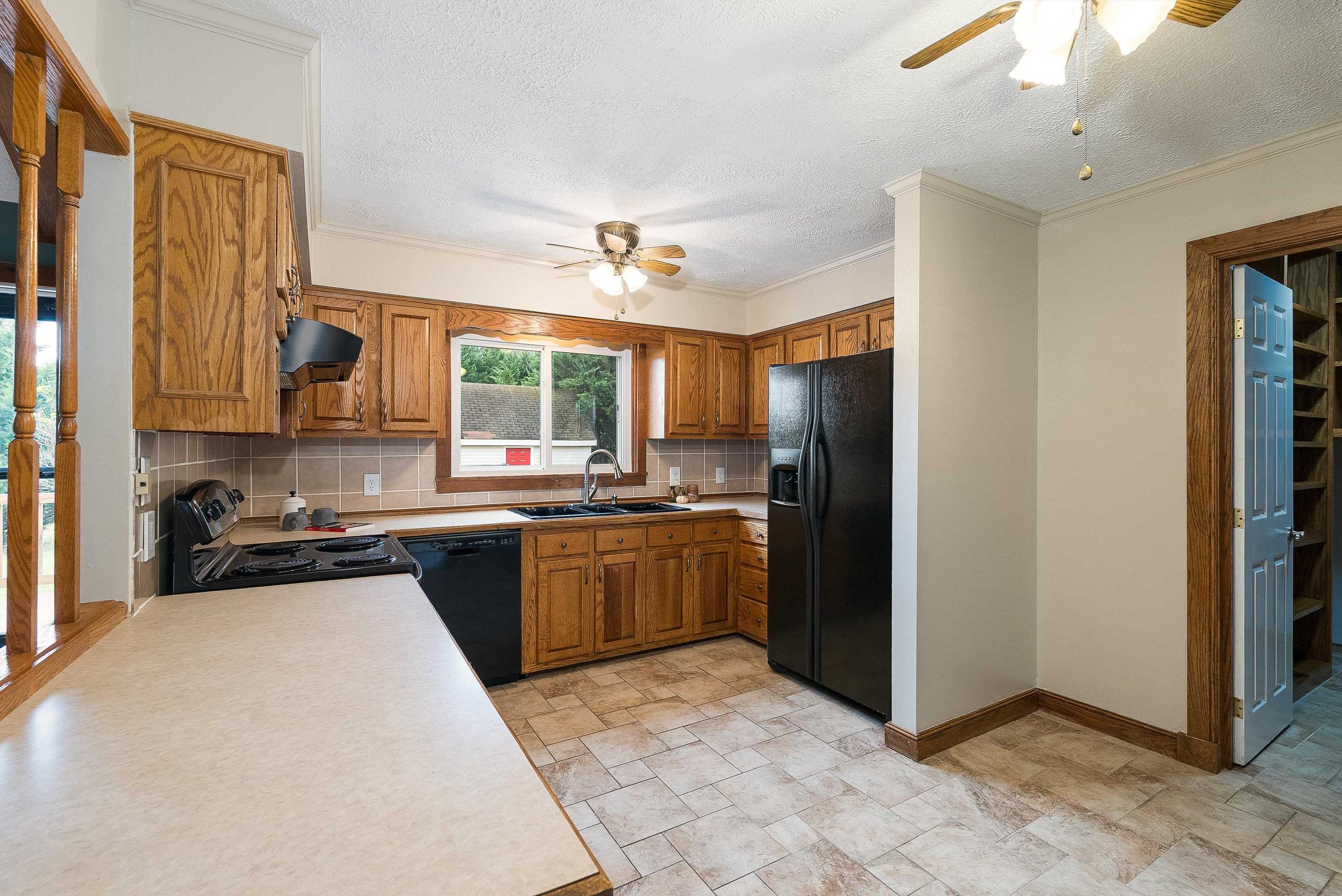 598 Broadhead School Road Greenville, VA 24440 - Photo 24 of 55 a kitchen with stainless steel appliances granite countertop a refrigerator a stove and a sink