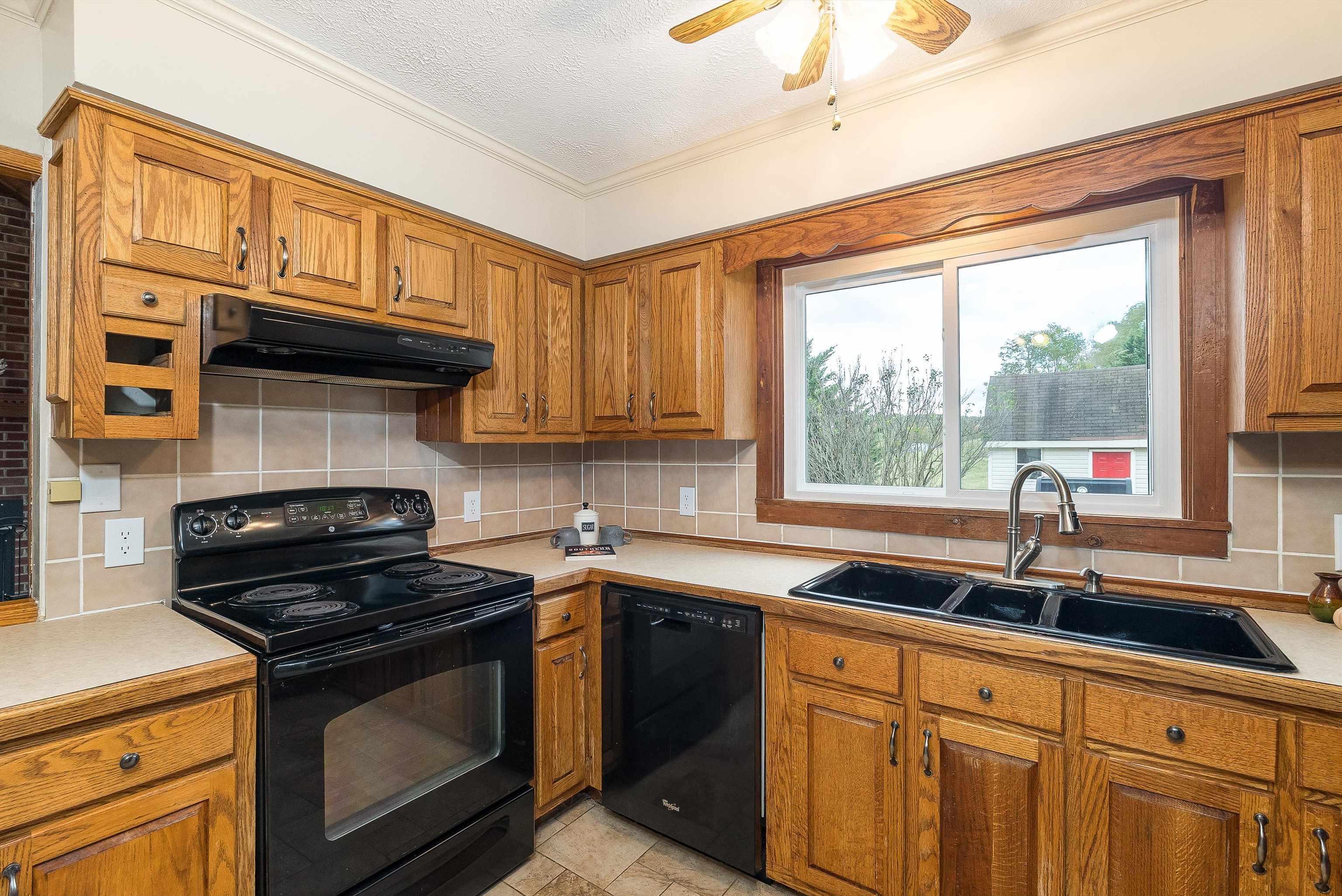 598 Broadhead School Road Greenville, VA 24440 - Photo 25 of 55 a kitchen with stainless steel appliances granite countertop a sink stove and cabinets