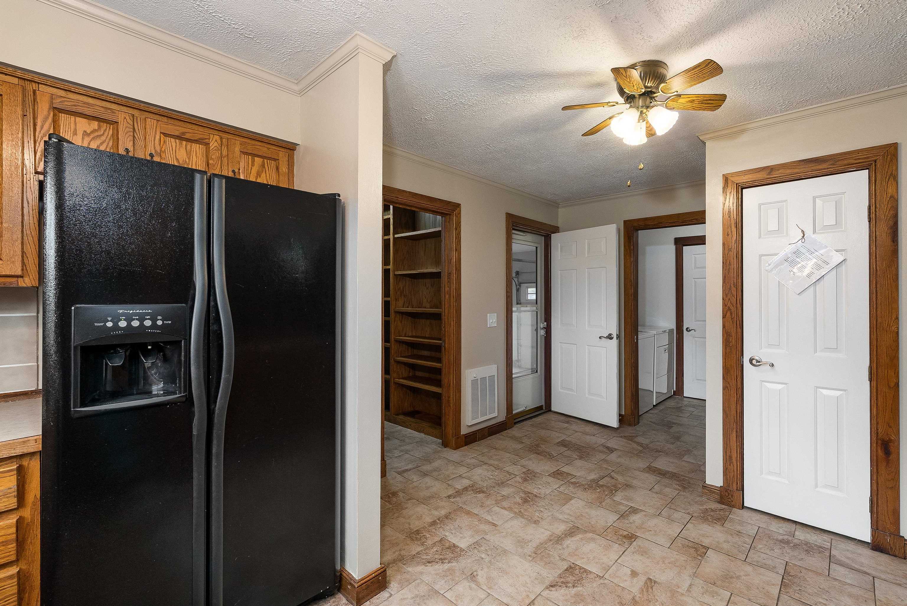 598 Broadhead School Road Greenville, VA 24440 - Photo 26 of 55 a view of a refrigerator in kitchen and an empty room