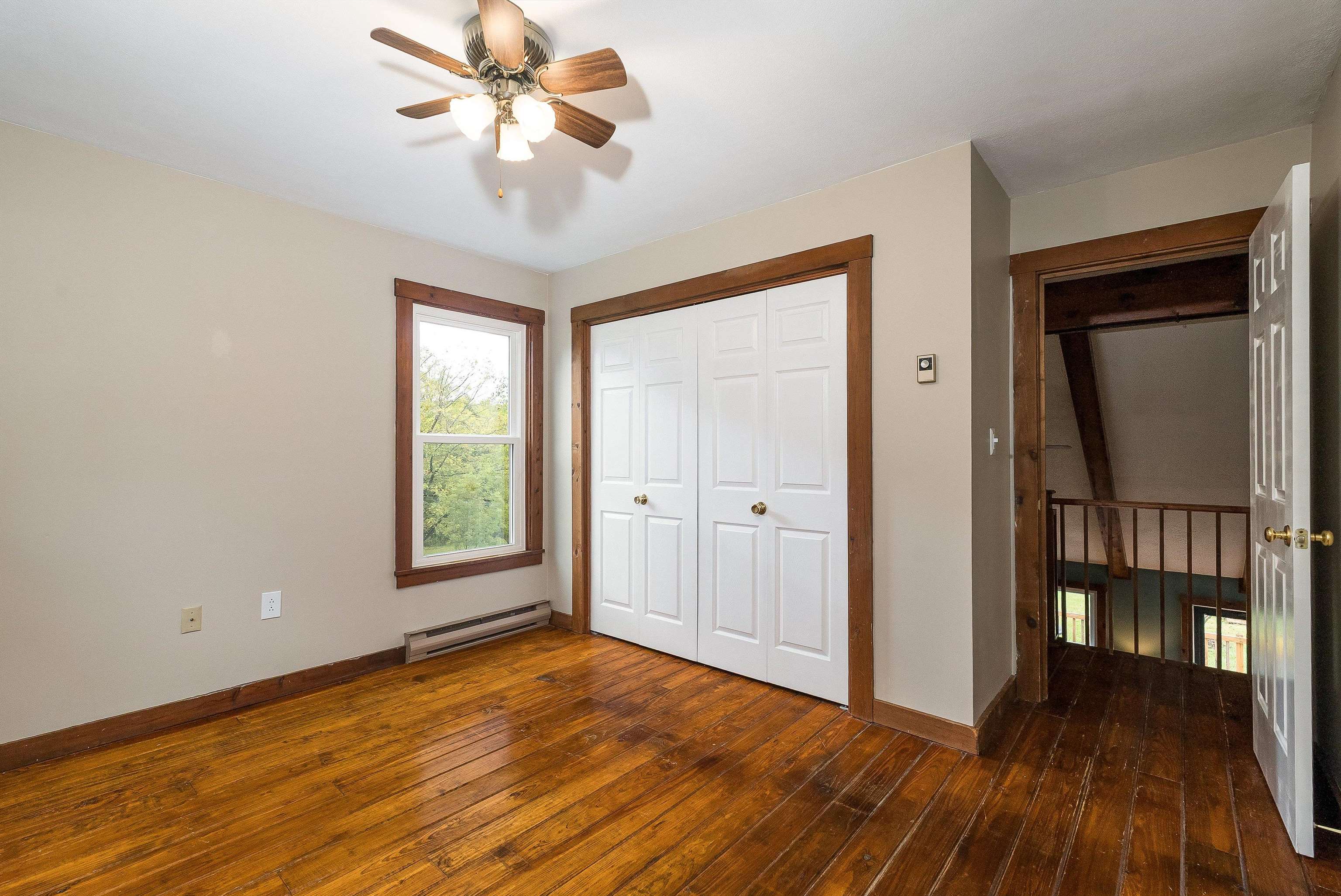 598 Broadhead School Road Greenville, VA 24440 - Photo 31 of 55 a view of empty room with wooden floor and fan