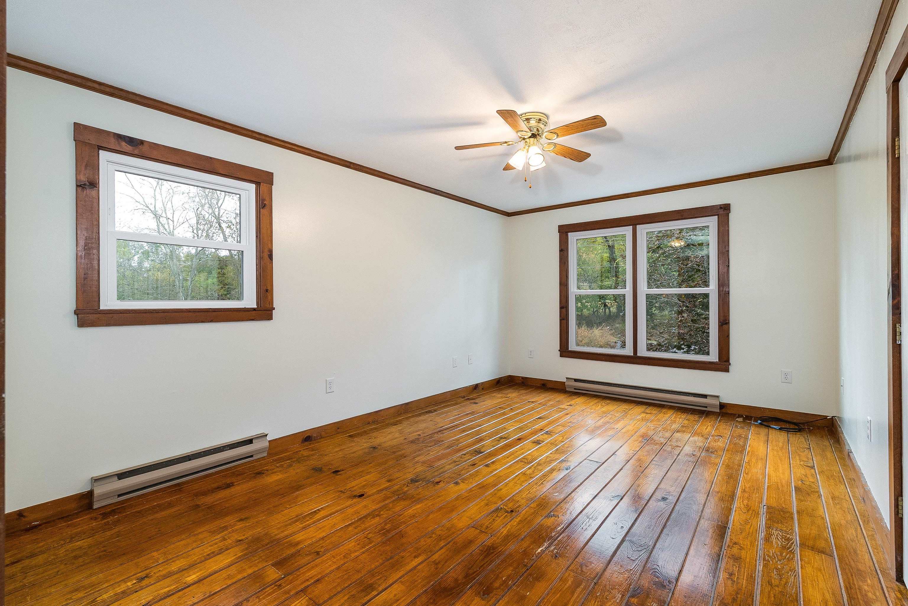 598 Broadhead School Road Greenville, VA 24440 - Photo 32 of 55 a view of an empty room with wooden floor and a window