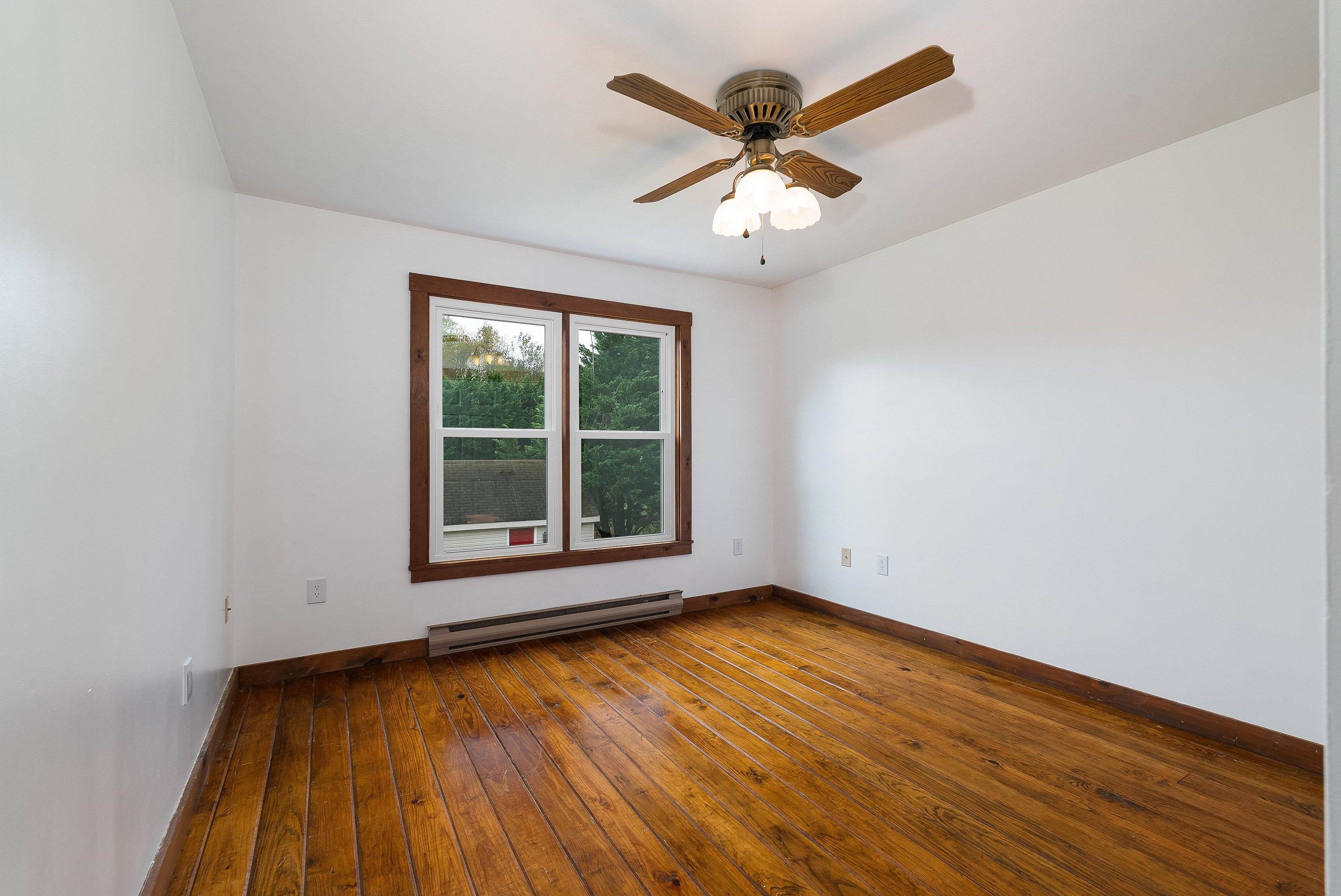 598 Broadhead School Road Greenville, VA 24440 - Photo 35 of 55 an empty room with wooden floor and windows