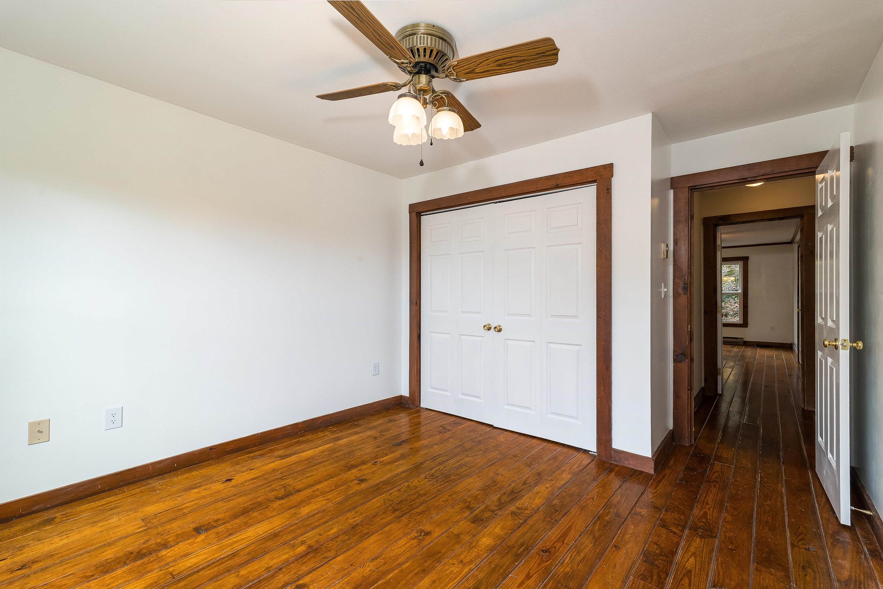 598 Broadhead School Road Greenville, VA 24440 - Photo 36 of 55 a view of a room with wooden floor and ceiling fan