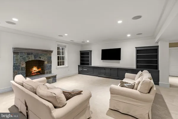 a workspace with furniture and a flat screen tv