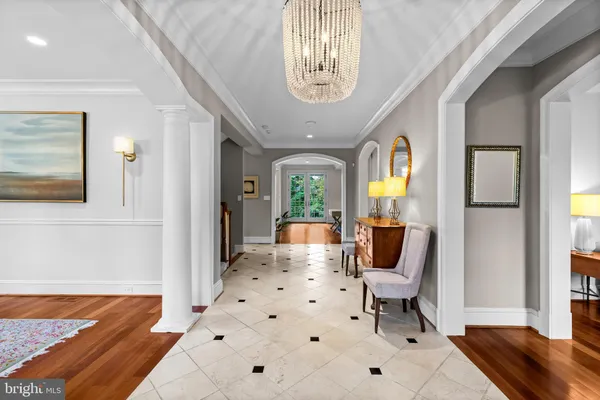 a view of a livingroom with furniture and a window