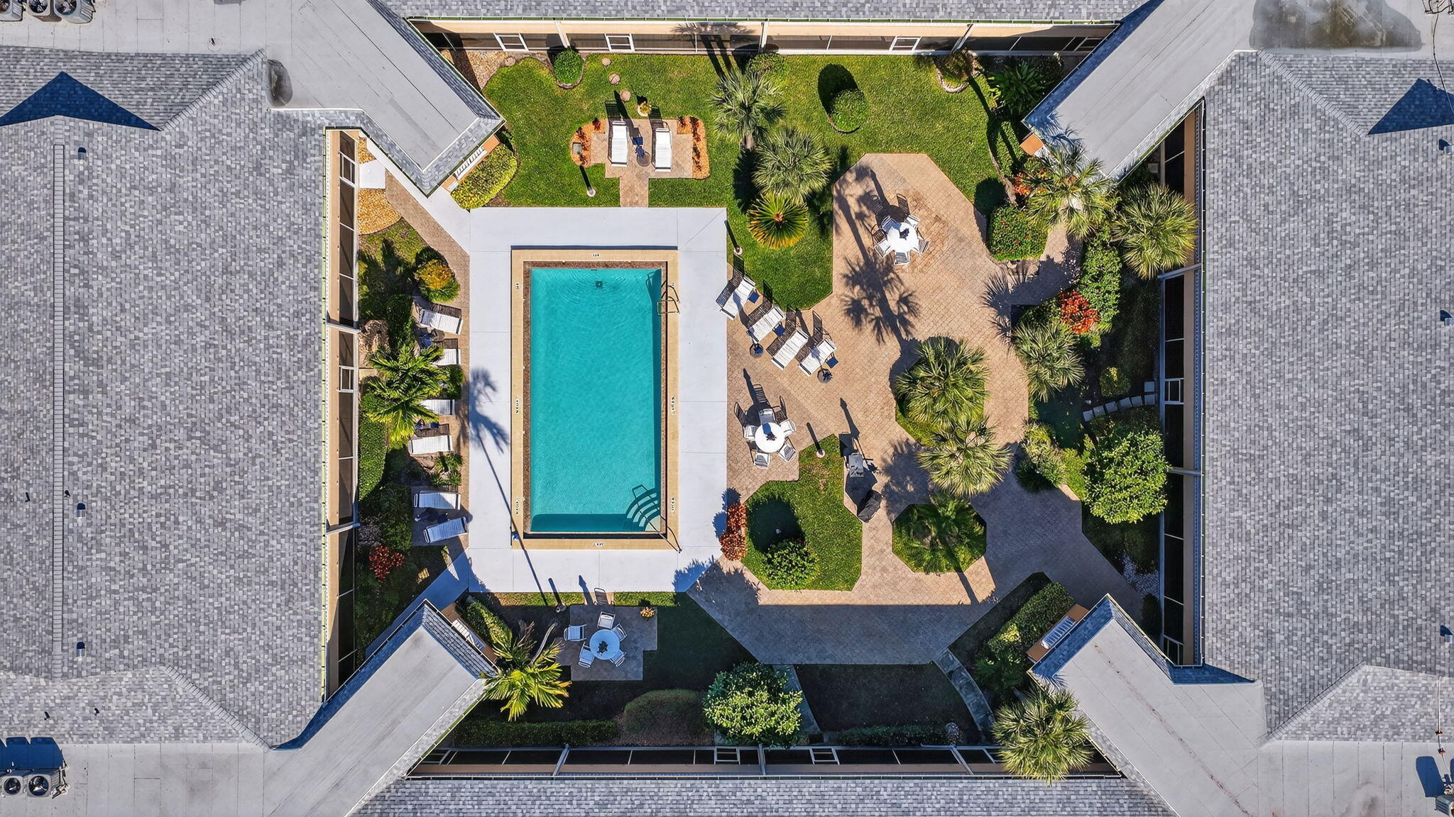 1100 Surf Road, Unit 201 Singer Island, FL 33404 - Photo 55 of 63 Aerial Courtyard Pool View
