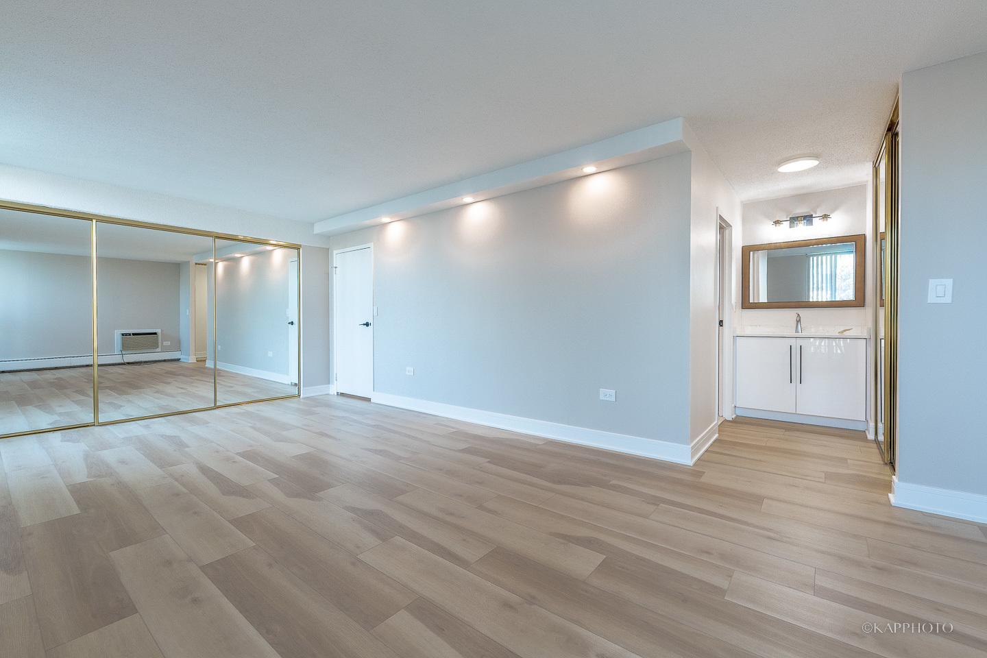 8801 West Golf Road, Unit 2I Niles, IL 60714 - Photo 13 of 29 a view of empty room with wooden floor