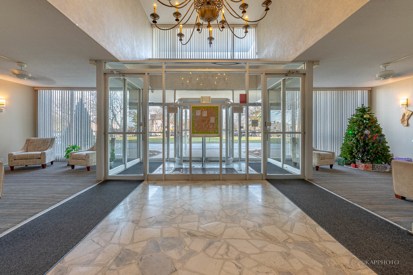 8801 West Golf Road, Unit 2I Niles, IL 60714 - Photo 25 of 29 a lobby with furniture and window