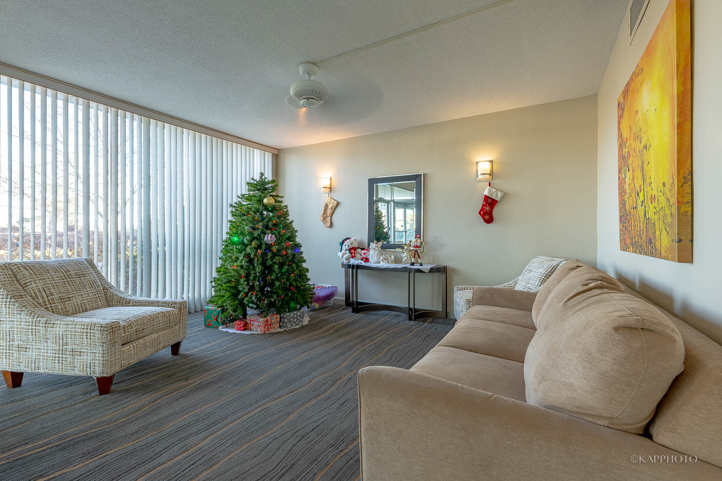 8801 West Golf Road, Unit 2I Niles, IL 60714 - Photo 26 of 29 a living room with furniture and a large window