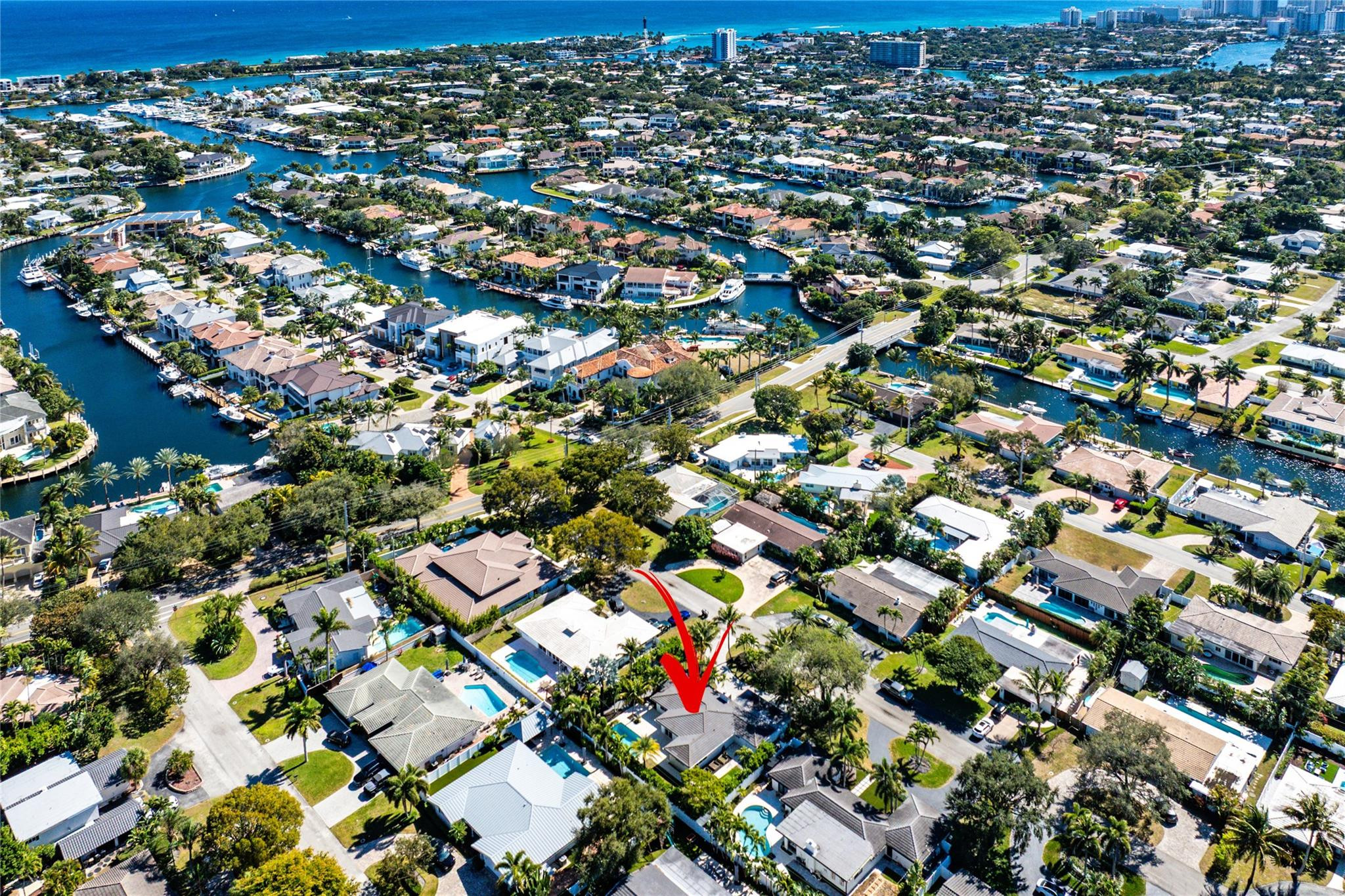 an aerial view of residential houses with outdoor space