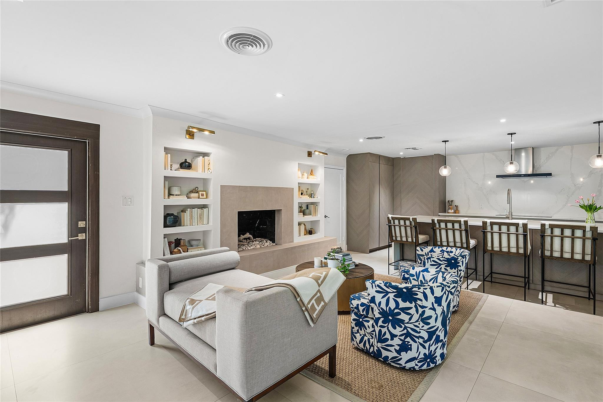 2233 Northeast 30th Court Lighthouse Point, FL 33064 - Photo 14 of 48 a living room with furniture and a fireplace