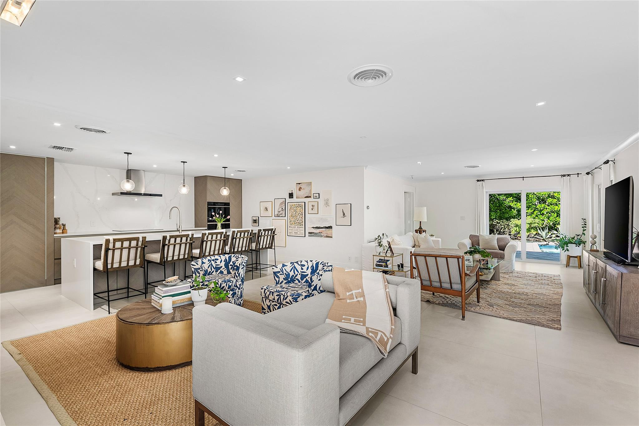2233 Northeast 30th Court Lighthouse Point, FL 33064 - Photo 18 of 48 a living room with furniture and a large window