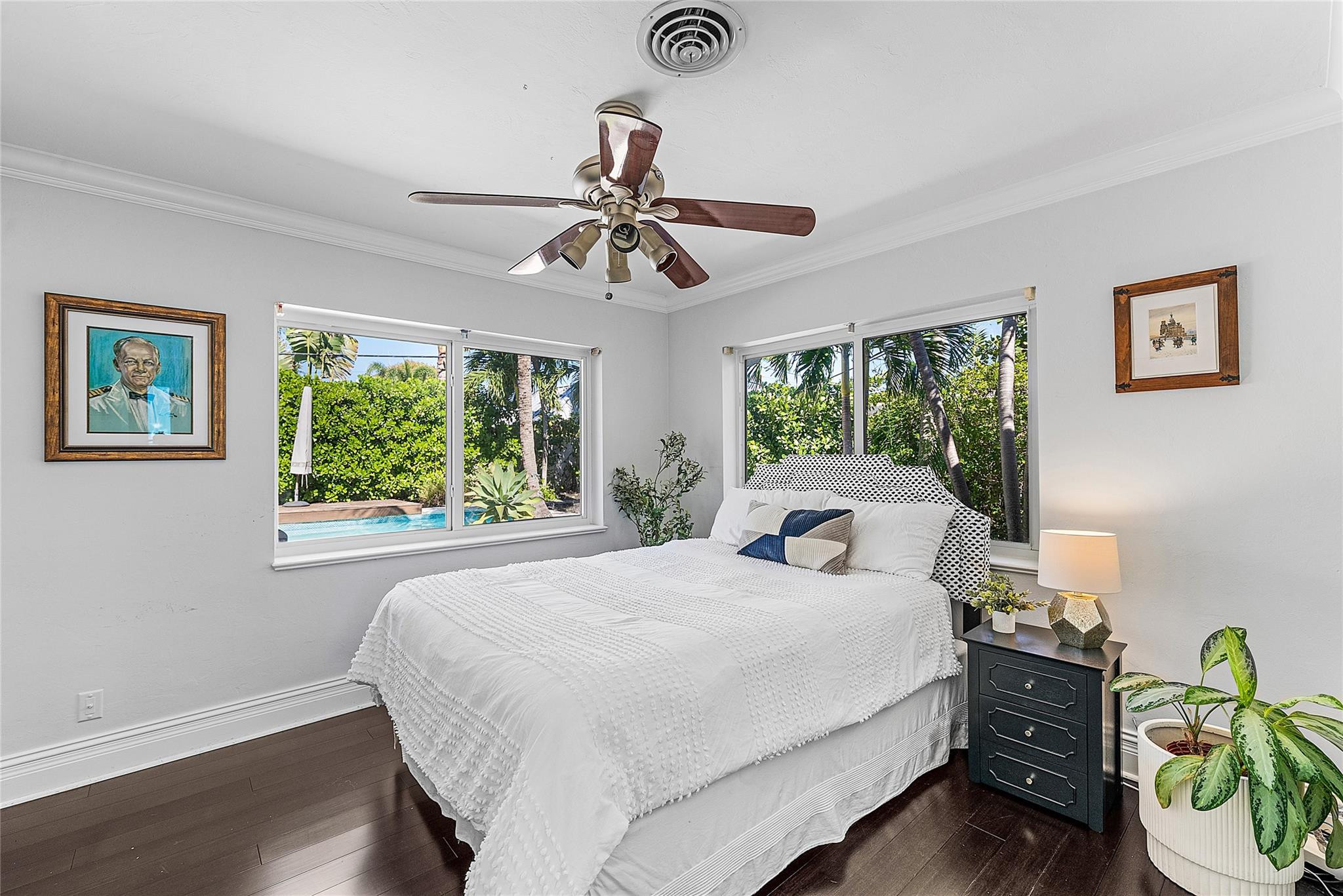 2233 Northeast 30th Court Lighthouse Point, FL 33064 - Photo 29 of 48 a bedroom with a bed and a window