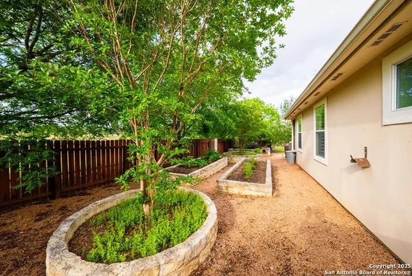 a front view of a house with yard