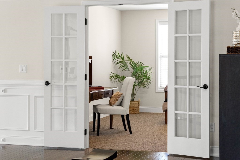 49 Pine Tree Drive, Unit 49 Methuen, MA 01844 - Photo 24 of 38 a view of a hallway with seating area