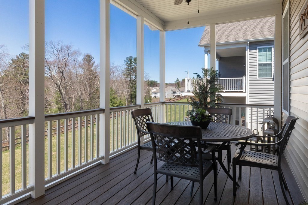 49 Pine Tree Drive, Unit 49 Methuen, MA 01844 - Photo 26 of 38 a view of a balcony with furniture