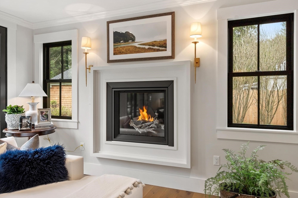 653 Main Street Concord, MA 01742 - Photo 5 of 42 a living room with furniture and a fireplace