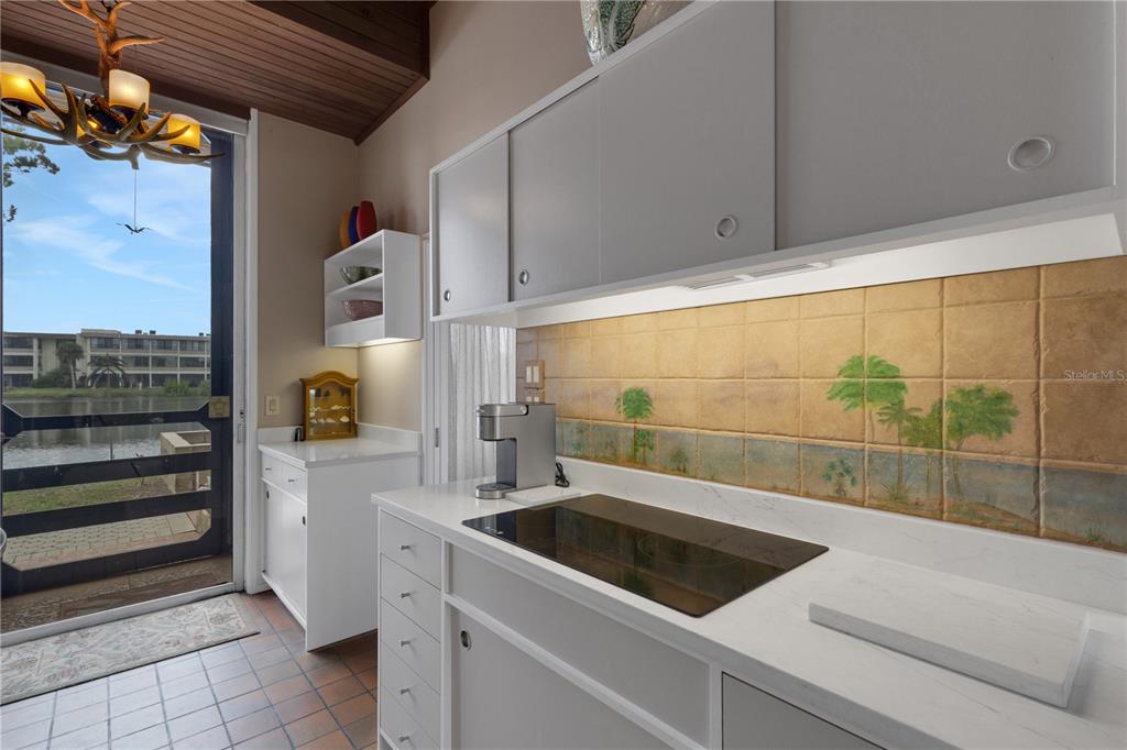 62 Sandy Hook Road South Sarasota, FL 34242 - Photo 14 of 66 a view of a kitchen with a sink and dishwasher