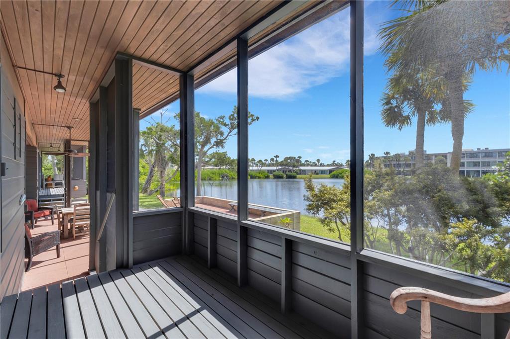 62 Sandy Hook Road South Sarasota, FL 34242 - Photo 27 of 66 a view of a balcony with lake view and a balcony