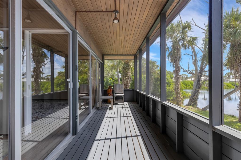 62 Sandy Hook Road South Sarasota, FL 34242 - Photo 28 of 66 a view of balcony with wooden floor