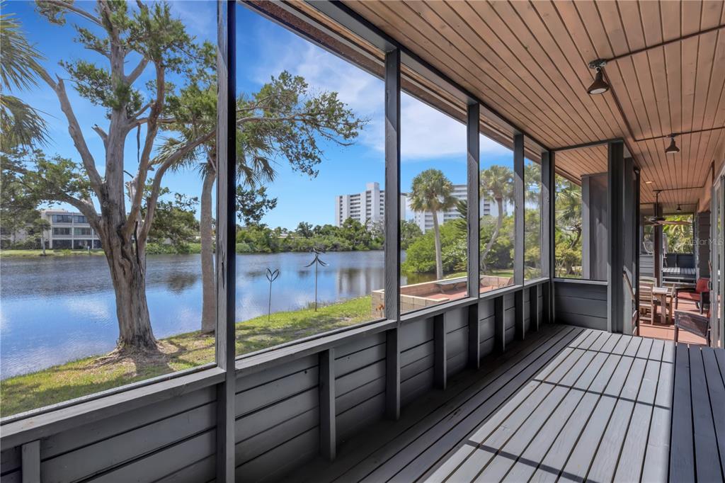 62 Sandy Hook Road South Sarasota, FL 34242 - Photo 29 of 66 a view of two chairs in the balcony