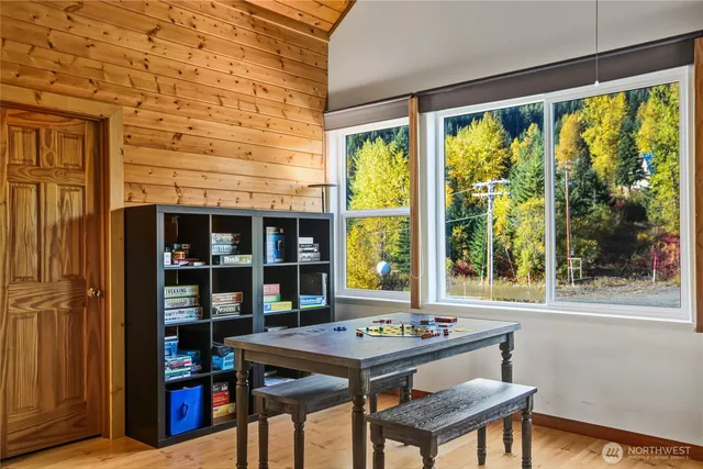 a room with a table and a window