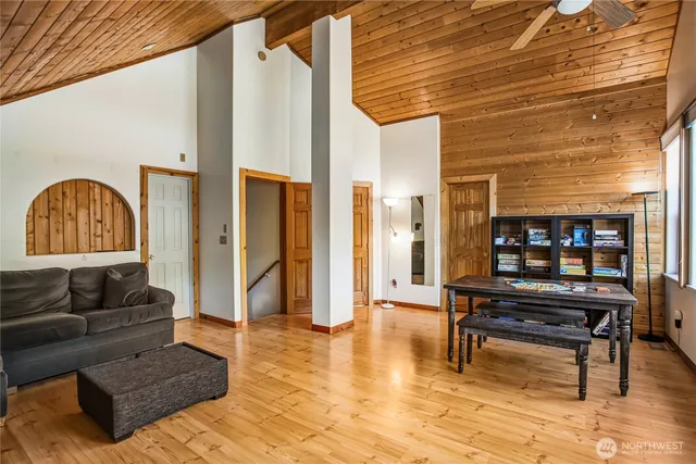 a living room with furniture and a rug