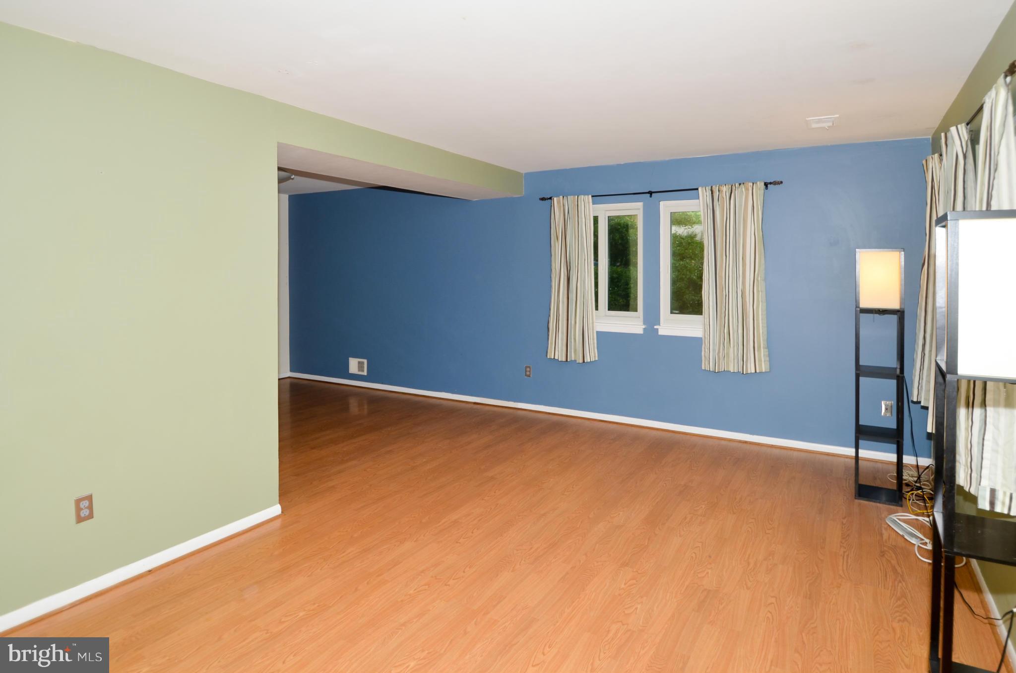 9608 Rocksparkle Row Columbia, MD 21045 - Photo 3 of 29 a view of an empty room with a window