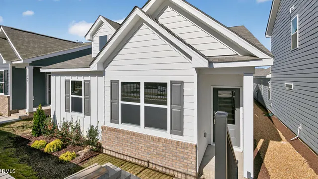 a view of house with wooden floor and outdoor space