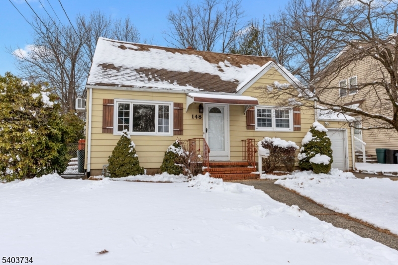 a front view of a house with a patio