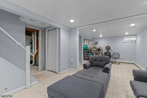 a living room with furniture and a couch