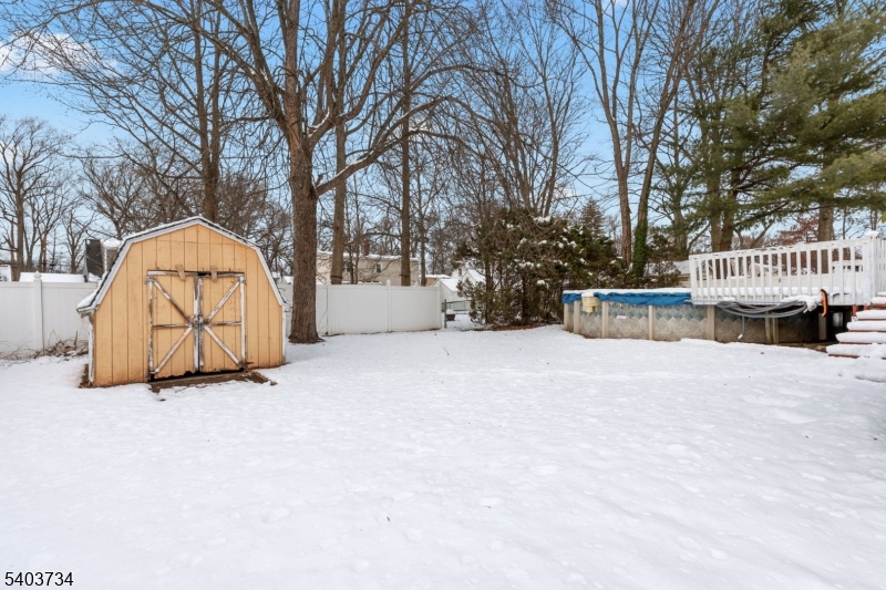 148 Locust Drive Union, NJ 07083 - Photo 27 of 34 a view of roof deck with large trees