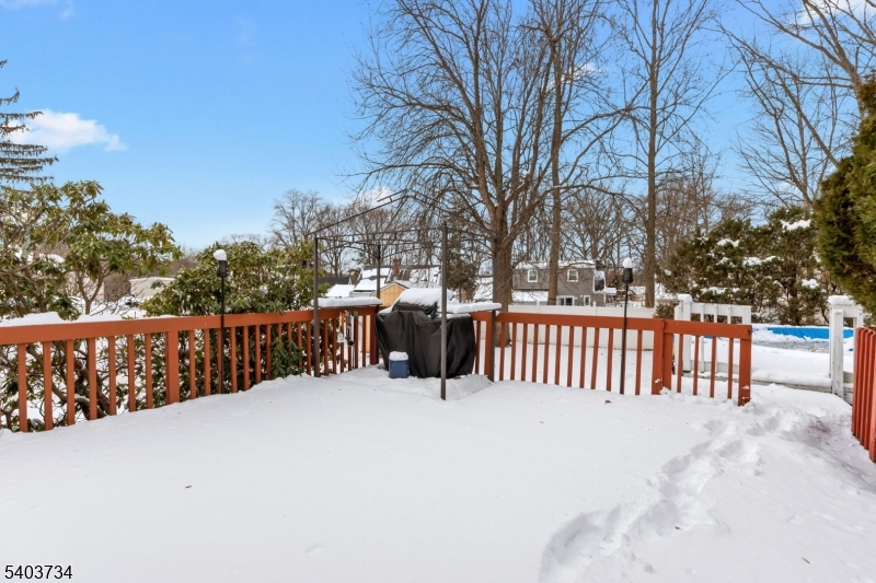 148 Locust Drive Union, NJ 07083 - Photo 29 of 34 a view of a bench in the snow yard