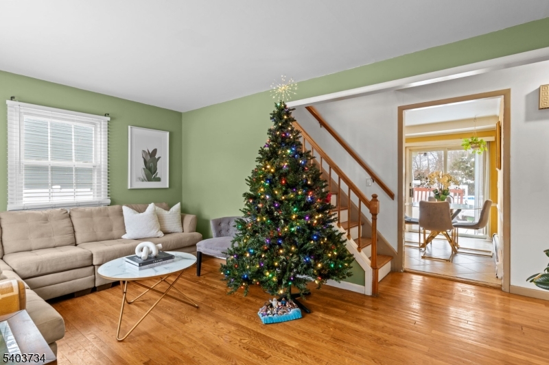 148 Locust Drive Union, NJ 07083 - Photo 3 of 34 a living room with furniture and a christmas tree