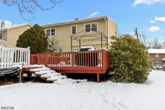 a view of a deck with a yard