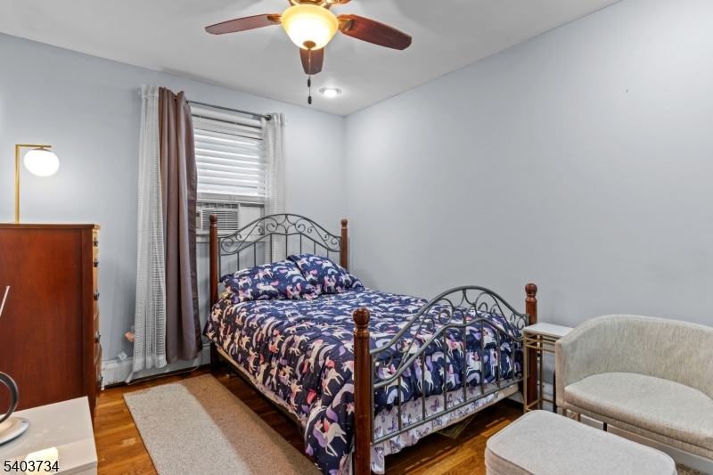 148 Locust Drive Union, NJ 07083 - Photo 10 of 34 a bedroom with a bed and window