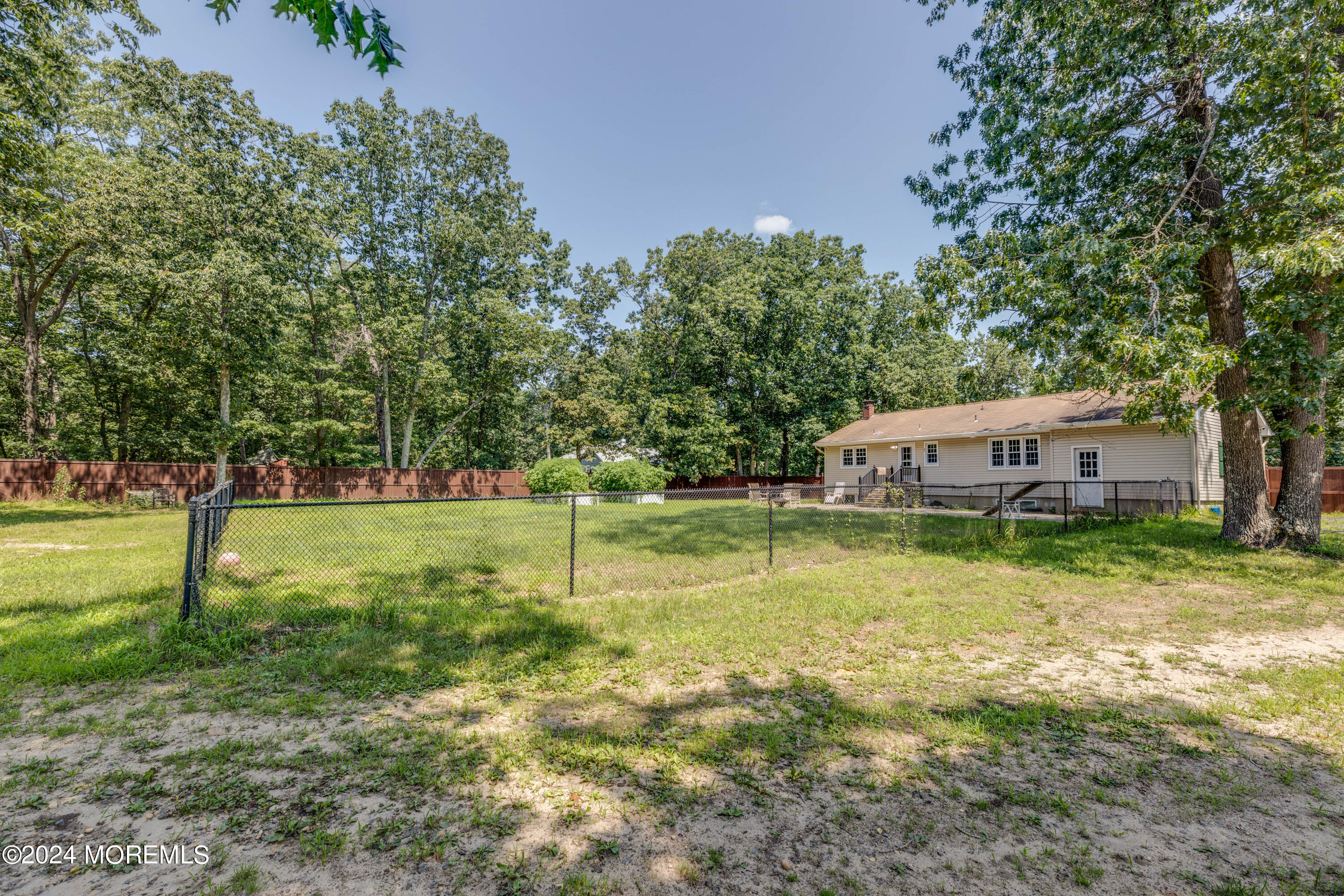 1202 Toms River Road Jackson, NJ 08527 - Photo 5 of 25 Fenced Backyard