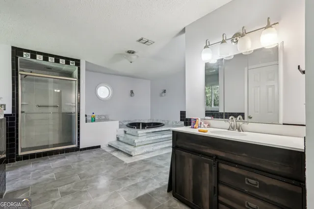 a view of kitchen and sink